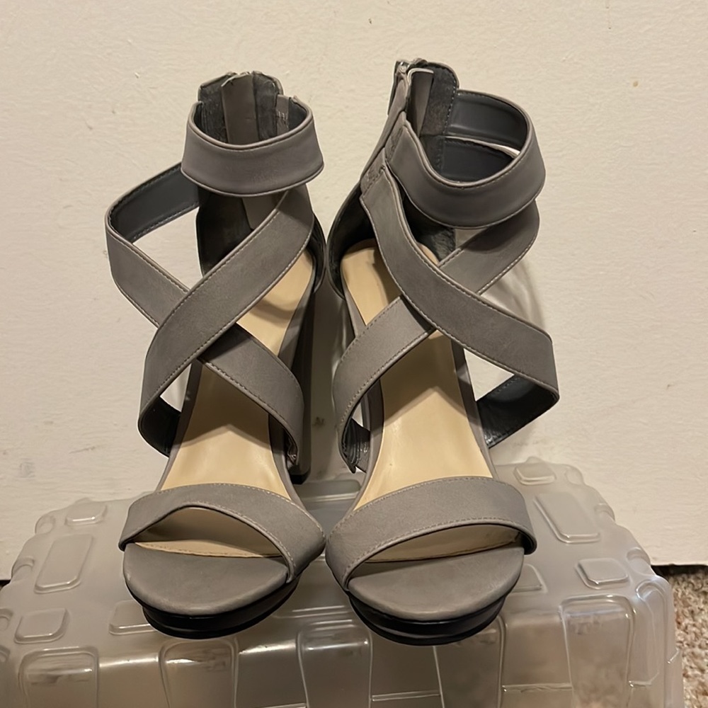 Never worn Gray ankle strap heels with zip up back